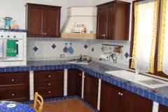 Sportelli per cucina in muratura in legno massello Toulipè